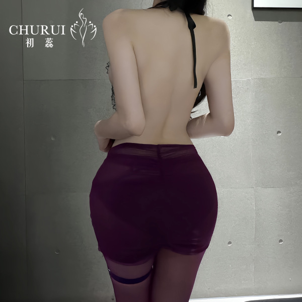 Woman wearing chu rui deep v-neck lace-up bodycon dress, back view showing open design and purple stockings.
