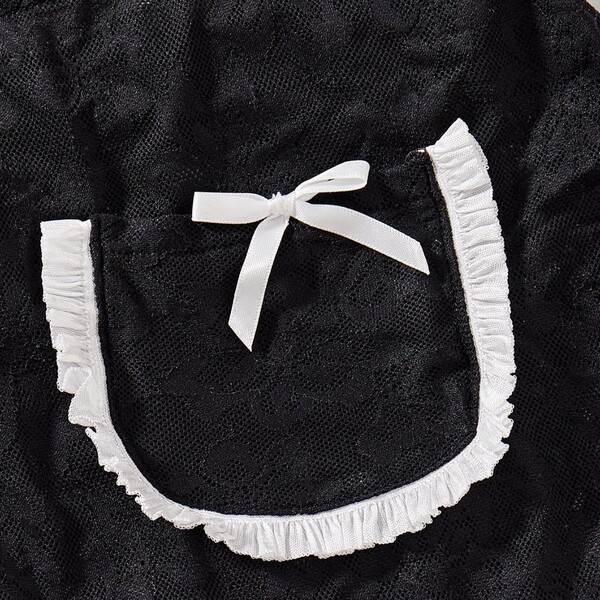 Black lace maid costume apron with white ruffle trim and bow, part of a sexy lingerie sleepwear set for womens roleplay.