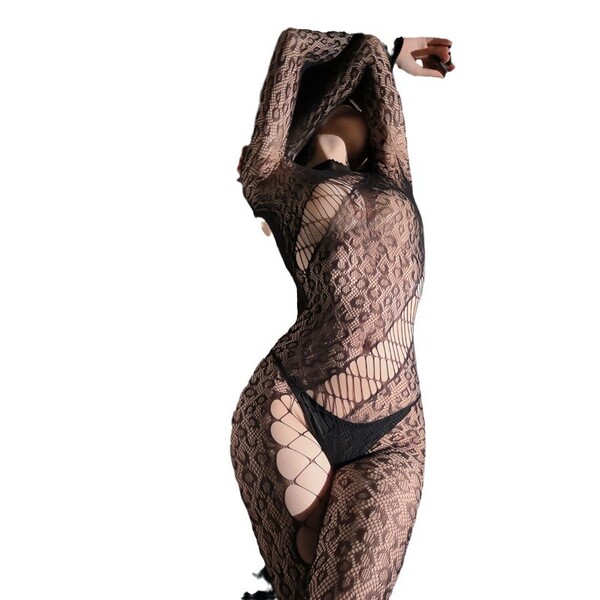 Woman wearing domoila sheer leopard bodysuit with irregular mesh, backless lace-up design, and sensual lingerie style.