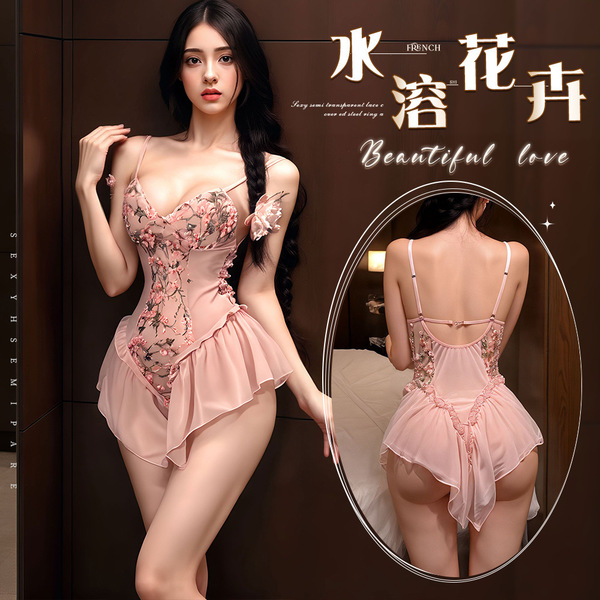 Woman modeling pink floral lace bodysuit with corset-style shapewear, adjustable straps, and sheer mesh back detail.