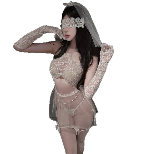 Woman wearing elegant white bridal lingerie set with sheer chiffon, lace gloves, and veil for sensual wedding night.