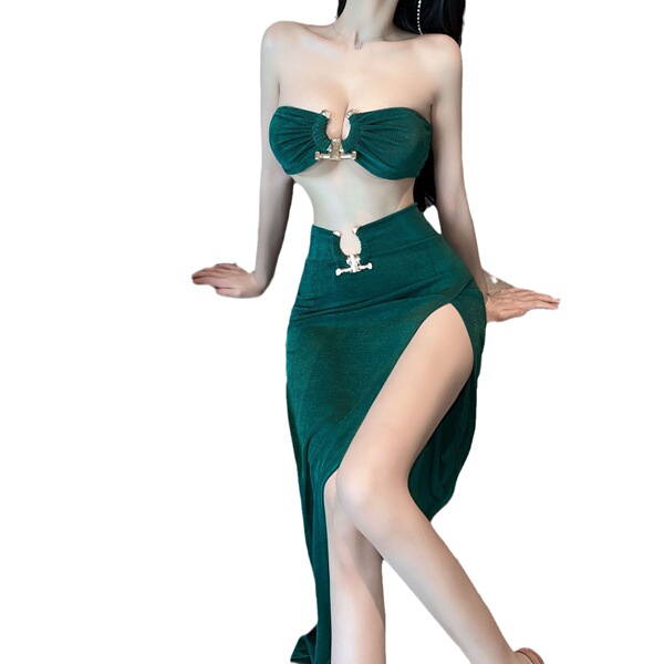 Woman wearing emerald green sexy lace wrap dress with high slit and backless design, perfect for nightclub or lingerie set.