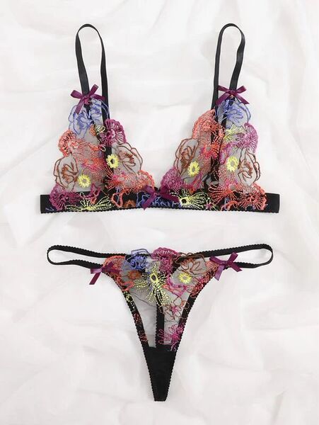 Vibrant floral embroidered lace bra and panty set with colorful blooms, sheer mesh, and black trim for a bold european-style ...