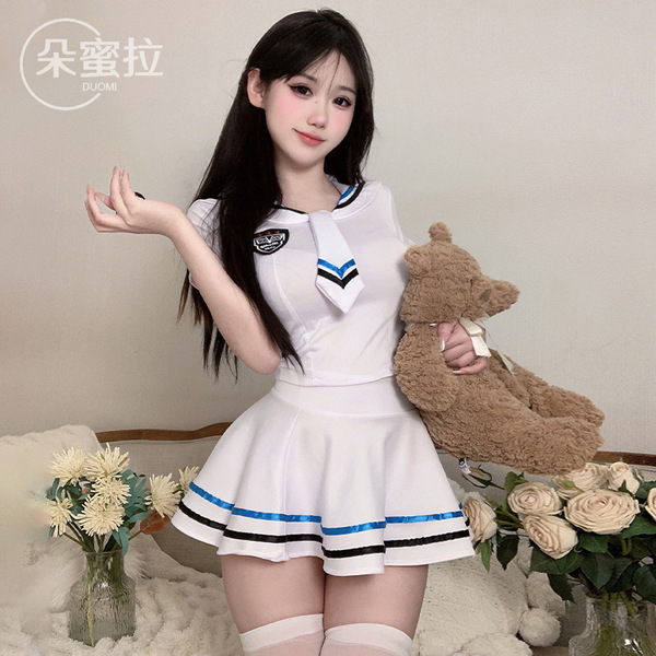 A woman models a domoira sexy lingerie set, featuring an innocent jk sailor style costume with maid and cosplay elements, per...