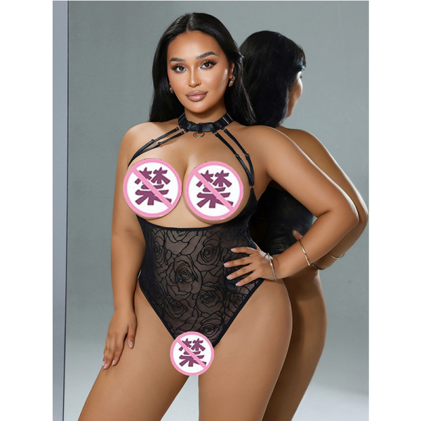 Woman modeling black sheer rose-pattern bodysuit with open-crotch design and halter straps.