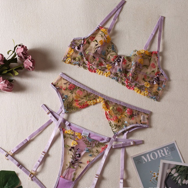 Floral embroidery lace bra set with sheer push-up design and matching garter belt, featuring vibrant floral patterns.