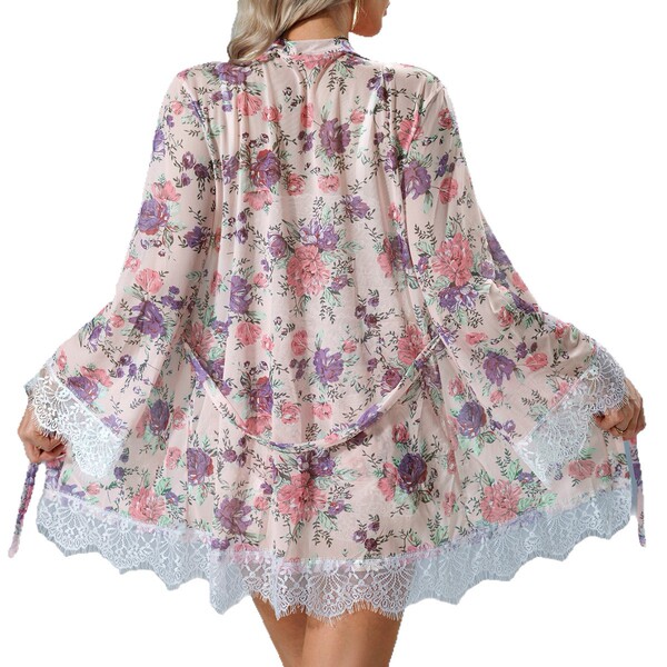 Woman wearing floral lace lingerie set with matching cami and shorts, romantic sleepwear outfit for at-home wear.