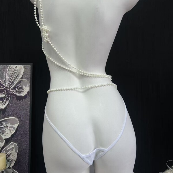French-style lace mesh bikini panties featuring sheer cross-straps and cotton crotch design, perfect for women seeking sexy y...