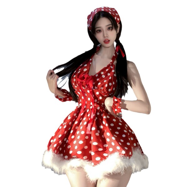 A woman wears a festive red polka dot dress with white fur trim, paired with a matching headband and bralette, perfect for ne...
