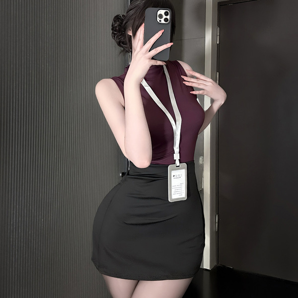 A woman poses with a smartphone, wearing a form-fitting maroon top and black skirt, paired with a lanyard badge. the outfit f...