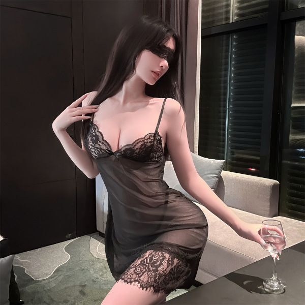 Woman wearing golden night sexy lingerie set, sheer strapless bra and matching briefs with lace trim.
