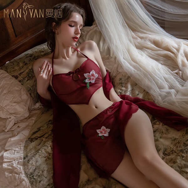 Vintage-chic floral embroidery on sheer fabric, elegant hanfu-inspired design for sensual allure.