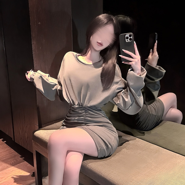 Woman in hong kong style flirty lingerie dress with ruffled bodycon mini skirt and waist-cinching sensual design, posing eleg...