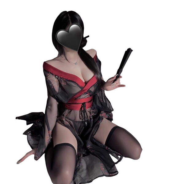 A woman poses in a black floral japanese-style lingerie kimono set, featuring a seductive design with no-remove stockings and...