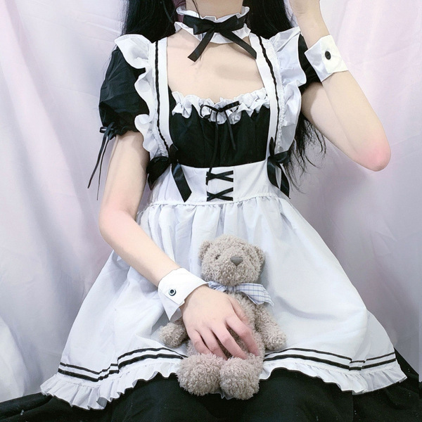 Japanese style black and white maid dress with lace trim & bow - cosplay costume & party outfit featuring ruffled sleeves, co...