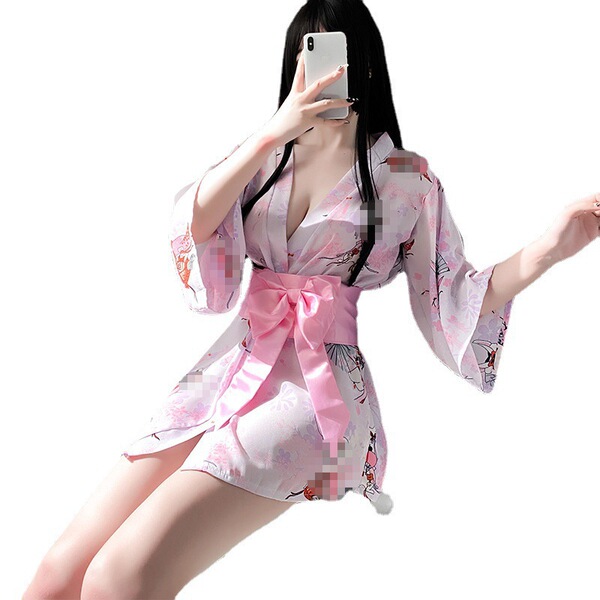 A woman poses in a japanese-style bunny kimono, featuring a pink floral design and a large bow at the waist, perfect for summ...