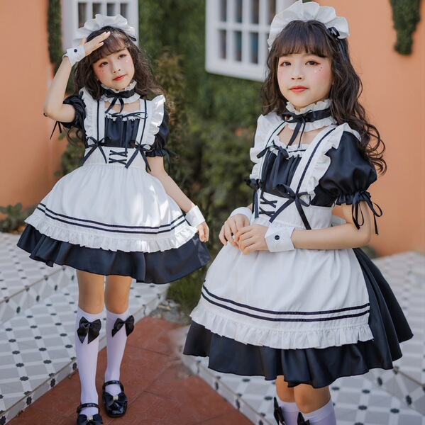 Two girls wearing japanese girl black maid dresses, cute lolita princess costumes perfect for kids, kawaii child servant outf...
