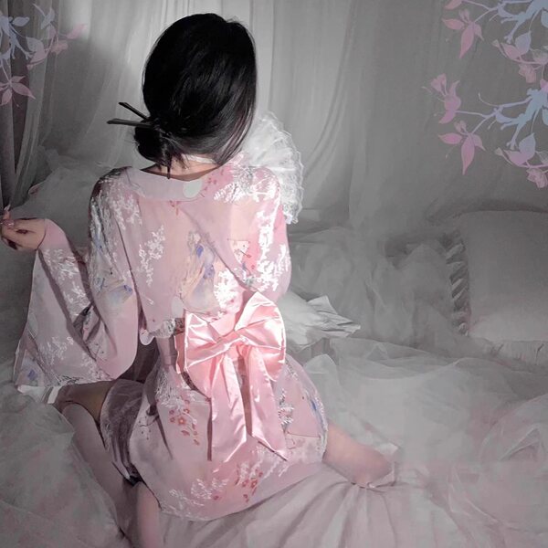 Japanese-inspired sheer kimono sleep set featuring delicate lace trimmings, perfect for a feminine and elegant nights rest.