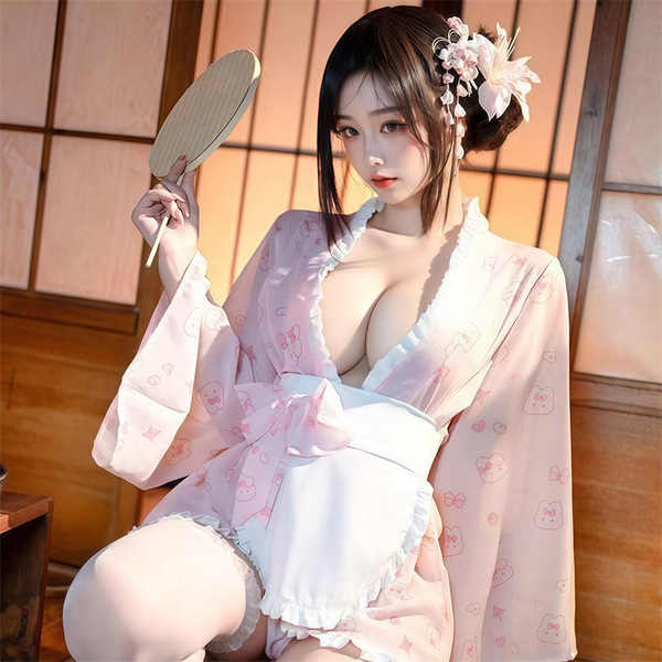 A woman wears a japanese kawaii bunny kimono robe, featuring lace details, bows, and floral prints, perfect for private wear.