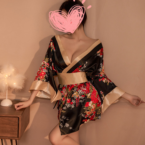 A woman wears a black floral japanese-style sheer kimono robe set, featuring a deep v-neckline and heart-shaped overlay, perf...