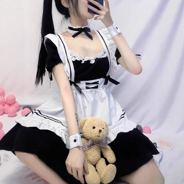 Japanese maid cosplay dress featuring black and white colors with ruffles, perfect for anime school uniforms or lolita outfit...