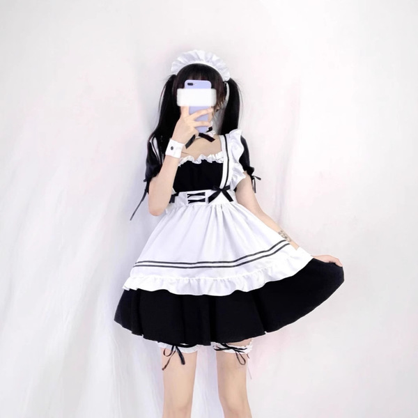 Japanese maid cosplay dress featuring black and white sailor-style design, perfect for anime school uniforms or lolita outfit...