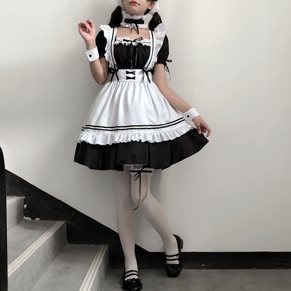 Japanese maid costume dress featuring black and white colors, cute anime schoolgirl design with ruffles and bow details, perf...