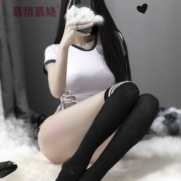 Woman posing in white sailor-style bodysuit with adjustable straps, black thigh-highs, and removable details for a sexy schoo...