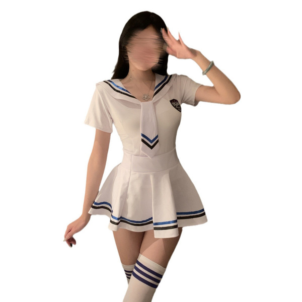 A petite woman wears a white sailor-style jk uniform set, featuring blue trim details and knee-high socks, perfect for a scho...