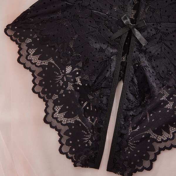 Luxury lace bodysuit featuring sheer elegant full lace design, perfect for women seeking stylish and intimate lingerie with a...