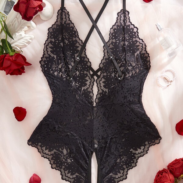 Luxury lace bodysuit featuring sheer elegant design with intricate floral patterns, perfect for women seeking stylish and sen...