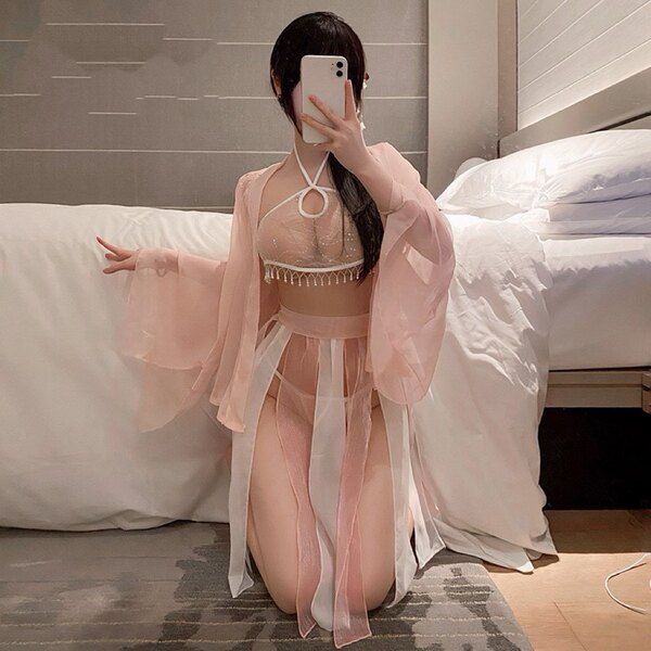 A woman poses in a sheer lace nightgown ensemble inspired by hanfu, featuring a delicate chemise and flowing robe, perfect fo...