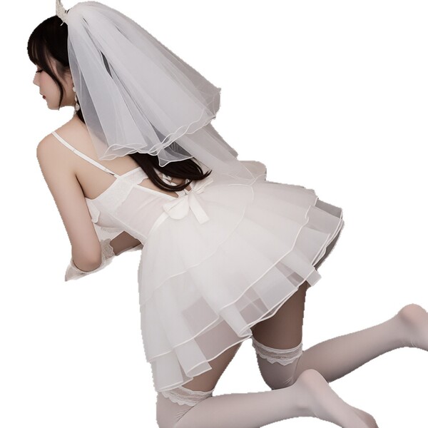 Woman wearing white lace mesh sheer deep v bodysuit with veil, posing in erotic sleepwear and lingerie set.