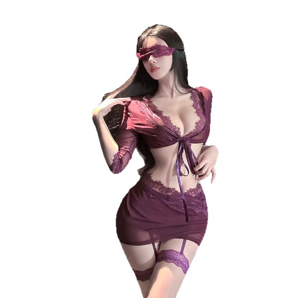 Woman in purple lace lingerie set with blindfold, featuring a seductive pure-yu style bondage bra and panty for women.