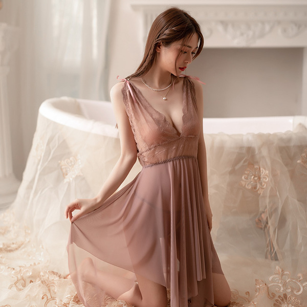 Wholesale lace sexy sleepwear set featuring a delicate pink nightgown with sheer fabric and a deep v neckline, perfect for sp...