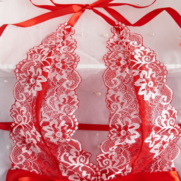 Lace sheer bodysuit featuring intricate floral patterns, elegant red ribbon accents, and a sexy european design for full-body...