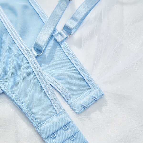 Light blue lace sheer bodysuit detail with adjustable straps, showcasing delicate fabric design for womens intimate wear.