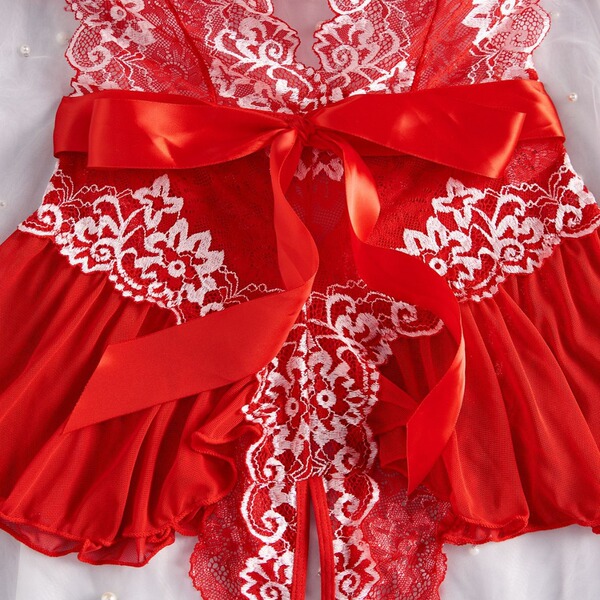 Red lace sheer bodysuit with floral patterns, featuring a prominent red ribbon bow at the waist, perfect for women seeking se...