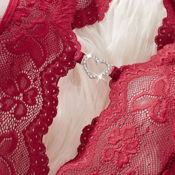 Red lace sheer bodysuit with heart-shaped rhinestone buckle, elegant european style design, perfect for intimate wear.