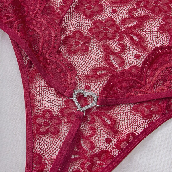 Lace sheer bodysuit featuring intricate floral patterns and a heart-shaped embellishment, perfect for european-style erotic l...