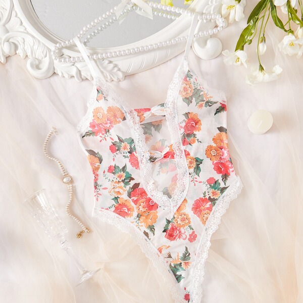 Floral lace sheer bodysuit for women, european-style erotic lingerie with ultra-feminine full-lace transparent design.