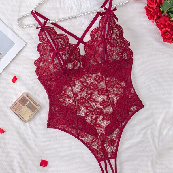 Sexy european style lace sheer bodysuit for women, featuring intricate floral patterns and delicate straps, perfect for intim...