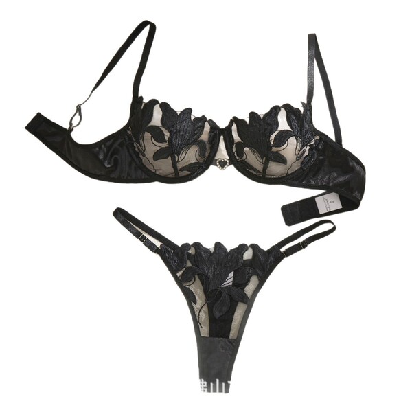 Luxury black lace lingerie set with underwire bra and thong, featuring sheer floral detailing for a sexy, elegant look.