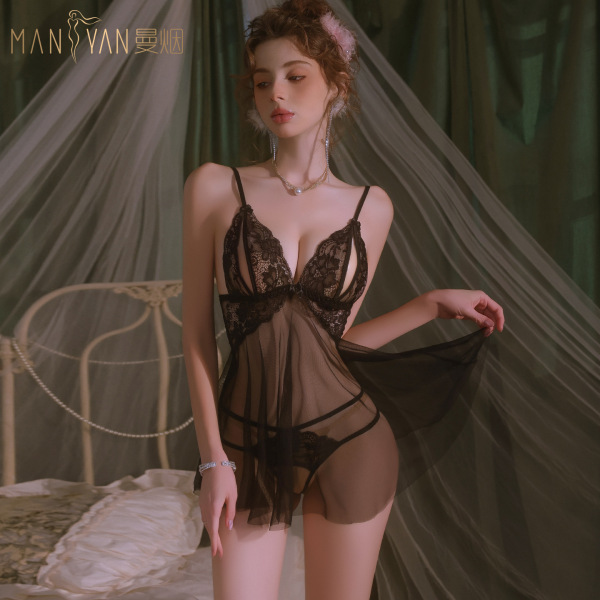 Woman wearing black lace sleepwear set with sheer overlay, romantic bedroom lingerie outfit featuring busty illusion design.