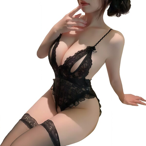 Woman wearing black lace bodysuit with open-crotch design, featuring delicate floral patterns and thin straps for a seductive...