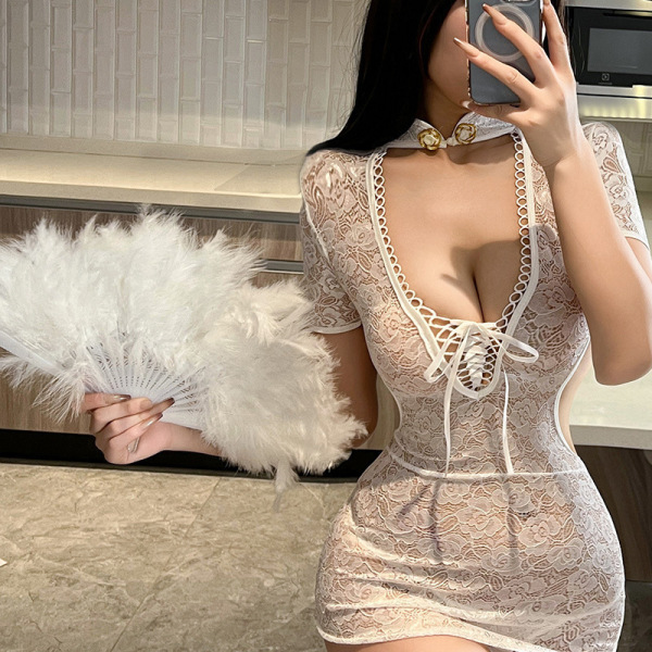 Woman in white lace bodysuit with deep v-neck and feather fan, showcasing the lace temptation lingerie set.