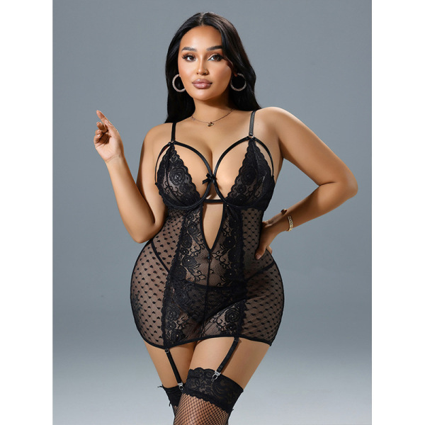 Woman wearing black lace temptation lingerie set with sheer push-up bra, matching panty, and garter straps for sensual style.
