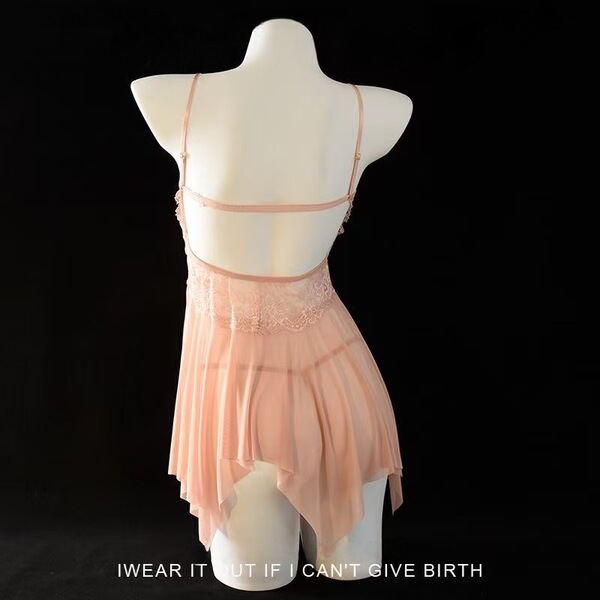 Back view of pink lace temptation sleep set featuring chemise with garter belt and sheer skirt on mannequin.