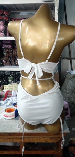 Elegant white bodysuit with lace trim and sheer mesh design, perfect for women seeking a sexy european-style look.