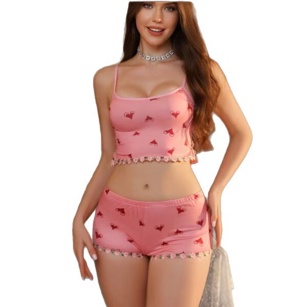 Lace-trimmed pink sleep dress featuring heart patterns, perfect for a sexy yet elegant nightgown look.